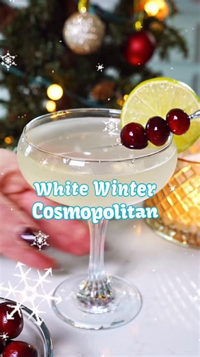 MyBartender.com | Cocktail Recipes + Tips on Instagram: "White Winter Cosmopolitan ❄️Comment “winter” for the full recipe! A seasonal twist on the classic cosmo, bright citrus, white cranberry, and a clean finish that’s perfect for winter entertaining! Cheers to the winter solstice 🥂✨ #mybartender #wintersolstice #cosmo #holidaydrinks"