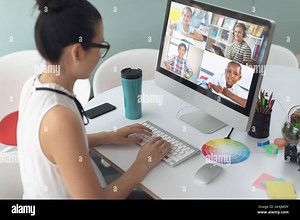 Asian girl using computer for video call, with smiling diverse high school pupils on screen. communication technology and online education, digital co Stock Photo - Alamy