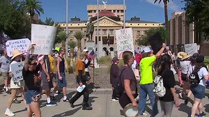 Demonstrations in Phoenix part of national protest against Trump's immigration crackdown, health cuts
