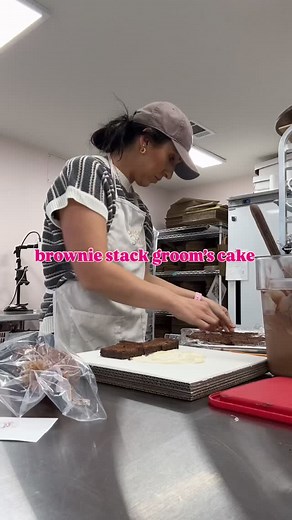 Behind the scenes of a brownie stack groom’s cake! Perfect for a groom who doesn’t like cake but loves a good brownie! #sweetstirrings #groomscake #louisianaweddings #batonrougeweddings #bakery #cakebaker | Sweet Stirrings