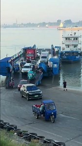 Ferry Across the River. Real Life Moments. A Busy Day of Vehicles and People Crossing the Water #5
