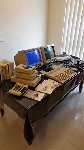 Commodore 128 vintage retro computer setup with dual crt monitors (40 & 80 column)