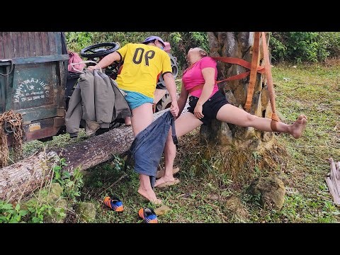 The way the girl dug up the tree roots; loading the wood onto the truck.