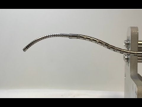 Concentric Push-Pull Robots: Slotted Tube Design