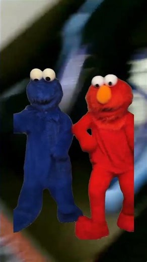 elmo and cookie monster dancing