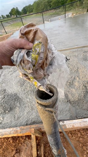 Recycling cement bags to clean concrete out of hoses! #concretepump #construction #concrete #diy