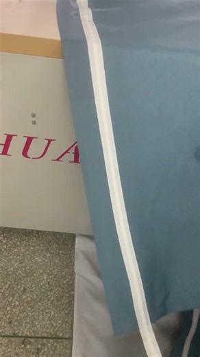 Curtain tape sewing machine with synchronized moving table for curtain mass production making