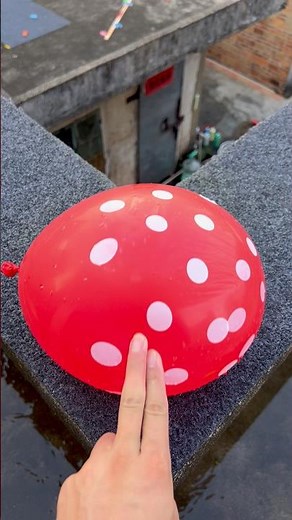 Experiment: Will a water balloon explode if it rolls down from a tall building? 💥🎈 #balloon