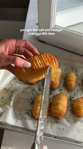 Salt and vinegar hasselbqck potatoes - the perfect, crunchy side Ingredients: 1kg potatoes, halved lengthways 2 1/2 cups white vinegar 3 cup water 1 tbsp salt 3-4 tbsp olive oil Sea salt, to taste 2 tbsp chives, finely chopped Method: 1. Preheat oven to 180C, fan-forced. 2. Lay potato half flat on a chopping board then place a chopstick on either side, slicing at 3-5mm intervals. Don’t cut all the way through the potato. 3. In large pot, pour in the vinegar, water and 1 tbsp salt. Add in potatoe