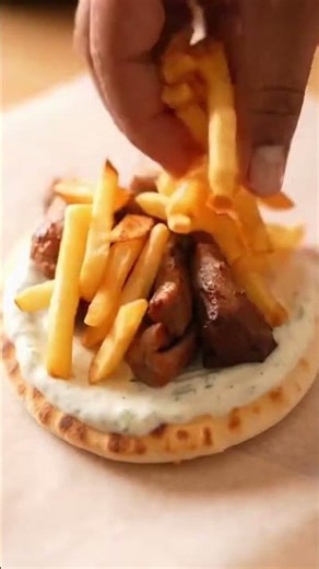We just created the ultimate Greek-style SHAWARMA BURGER… inside a PITA! 😱🔥