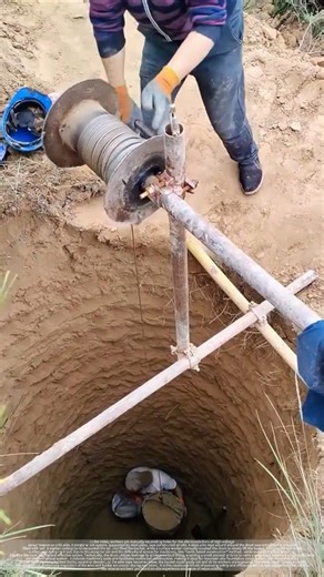 The process of manually winching and digging the pile foundation of a high-voltage power tower