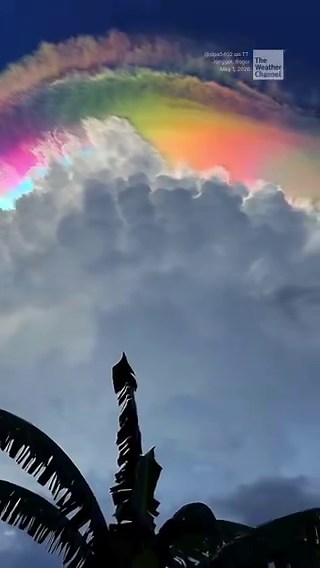 Stunning video shows an ultra rare phenomenon of iridescent clouds, which appears when sunlight interacts with lingering raindrops in the air after it rains.