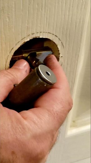 How do you take off a lever door handle?