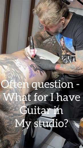 Guitar in tattoo studio?