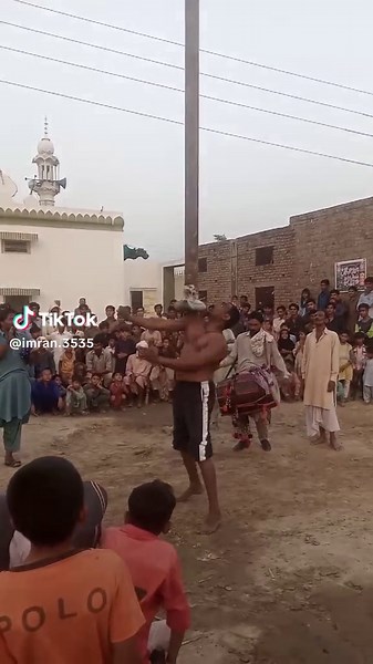 Balancing Stunt Performance in Courtyard Setting