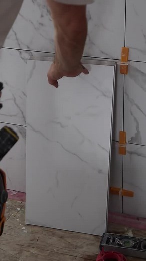 Walk-in shower part 1! #tileinstallation #constructionlife #tiler #showertile #bathroomdesign #showerwall #tilework #bathroomtile