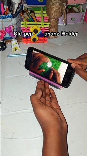 How to make a phone holder from waste pens #diy #craft #mobilestand #phoneholder #creativity
