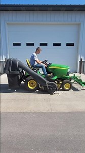 John Deere X485 Lawn Tractor with 54” Mower Deck, dethatcher and Bagger