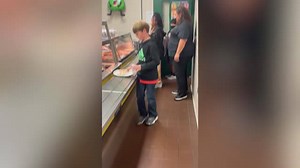 Students use ASL to place lunch orders for deaf cafeteria staff