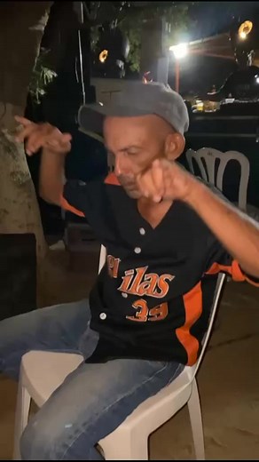 Sign Language Dance Moves in Nighttime Setting