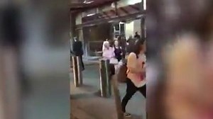 Fans flee from the arena after bomb blast