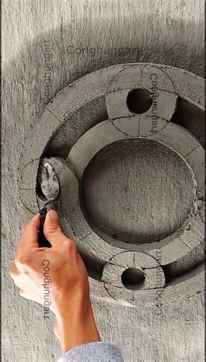 The circular patterns are cut by hand and linked together in a logical manner