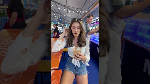 Model eats live shrimp during Bangkok street food adventure