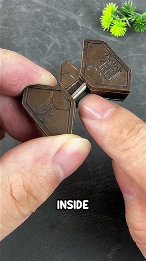How to solve this tricky metal puzzle