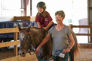 STAR offers therapeutic horseback riding for children and adults with disabilities