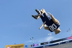Your mascot jumps around and claps. BYU’s Cosmo the Cougar straps on rollerblades and backflips off a giant ramp