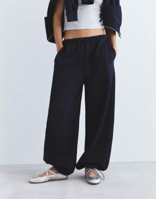 Pull&Bear Wide-leg tracksuit bottoms in navy | ASOS