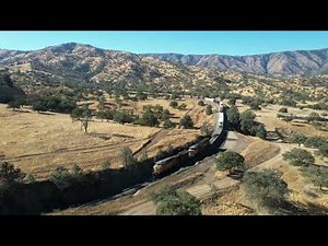 DRONE SHOT OF UNION PACIFIC DESCENDING THE WORLD FAMOUS TEHACHAPI LOOP