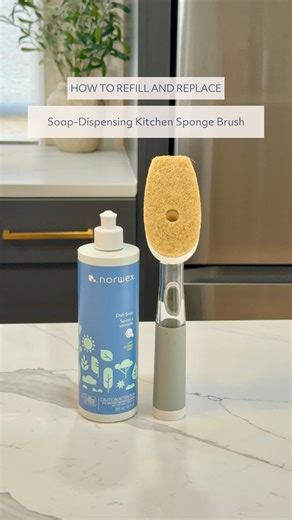Cleaning dishes has never been easier. 🧽💧 The Norwex Soap Dispensing Kitchen Sponge Brush helps you clean dishes faster, easier, and chemical free. Refill with ease: 🧽 Unscrew the head. 🧽 Slowly pour dish soap into the reservoir until it reaches the start of the threads. 🧽 Screw the head back into place. ✅ You are done and ready for action. Swap your pad in seconds: 🧽 Pull off the old pad from the base. 🧽 Press on a new one firmly. ✅ You are good to go for sparkling clean dishes. Make you