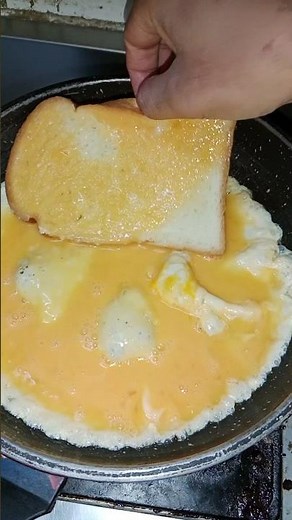 Here’s an easy way to make a ham and cheese sandwich for breakfast—adding sauce makes it even more