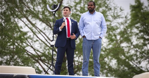 Austin Metcalf's father has angry exchange with 'Protect White Americans' protest organizer