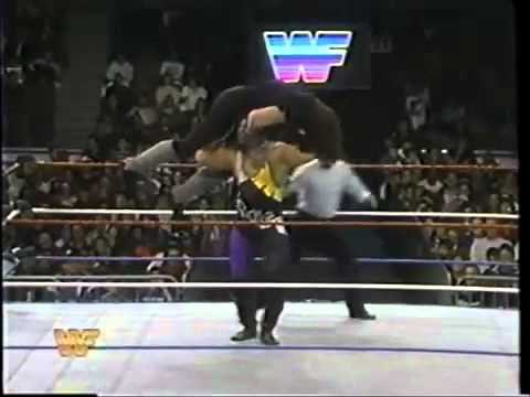 Brian "Crush" Adams Overhead Presses The Undertaker
