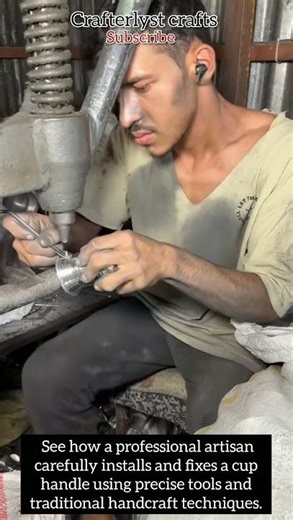 professional artisan carefully installs and fixes a cup handle using precise tools#amazingmachinery