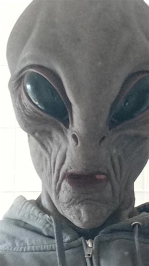 Alien Encounter in a White Tiled Room