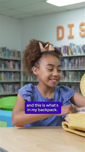 Mila's backpack has everything she needs to get through the day, including "Guts" by Raina Telgemeier (Raina Telgemeier's Comics) Help teachers give their students all the classroom supplies they need at DonorsChoose.org | DonorsChoose