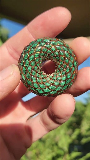 this malachite torus represents the natural flow of energy found throughout creation.