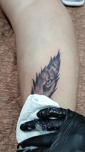 Unique Pinoy Tattoo Design Ideas Featuring Tiger and Feathers