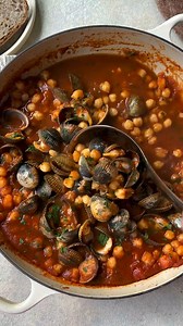 The air is getting a little colder. It’s a good thing - honestly! As if you enjoy seafood such as clams and mussels they are now back in the shops. We love to cook this simple chickpea and shellfish stew. Elegant and packed full of flavour, it’s also ready in under half an hour! To make, prepare 800g of clams or cockles (your fishmonger will be able to help with this) discarding any with broken shells. Heat a jar of Brindisa sofrito sauce in a large pan and add a jar of Navarrico chickpeas. Brin