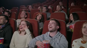 Young people laughing with comedy movie in cinema theatre | Free Stock Video Footage