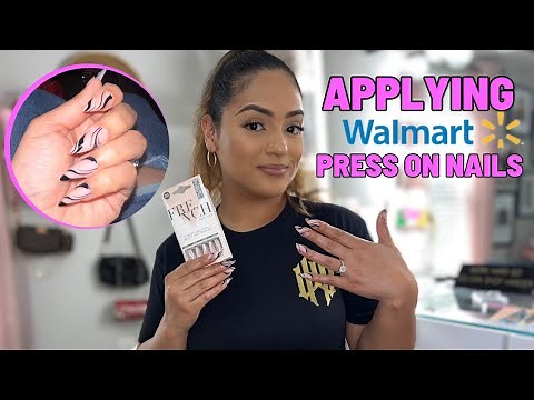 Applying Walmart press on nails for an event 🫣
