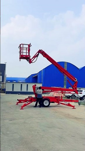 16m cherry picker working.Towable boom lift for aerial works.10m-24m working heights available.