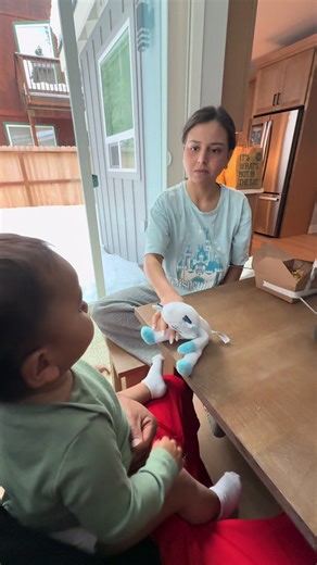Humorous Moments Between Mom and Baby: Fetching Fun!
