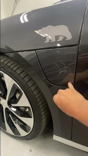 Opening the charge door on the Lucid Air