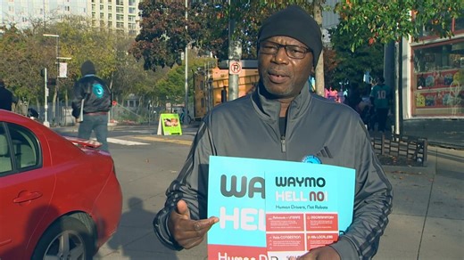 'Hell no, Waymo': Seattle rideshare drivers, union advocates rally against driverless taxi service