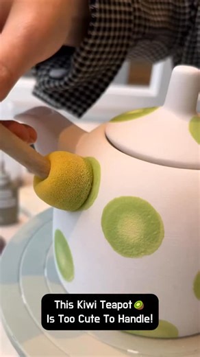 Love in Pottery on Instagram: "Creative Space (@creativespacedk) is Denmark’s first “Paint Your Own Pottery” café, offering a peaceful environment for anyone to explore clay and ceramics through hands-on painting. From beginners to seasoned potters, it’s a haven for creativity, mindfulness, and functional art. Creative Space showcases a juicy twist on pottery—transforming a plain clay teapot into a vibrant kiwi-inspired piece. She starts by dabbing soft green circles using a sponge, then careful