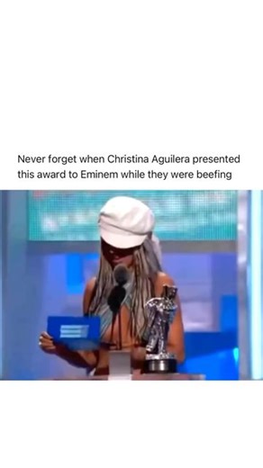 FBOY on Instagram: "Follow (us) @FUCKBOYPROBLEM.S for more celebrity content 😂💚 throwback 😂 One of the most memorable and awkward moments in MTV award show history occurred when Christina Aguilera presented an award to Eminem during a time when the two were publicly feuding. Their beef stemmed from lyrics in Eminem’s songs that took jabs at Aguilera, leading to tension between the two. Despite the ongoing feud, Aguilera was tasked with handing Eminem the award for Best Male Video at the 2002 